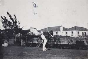 Tom Hutchinson playing tennis, Shanghai