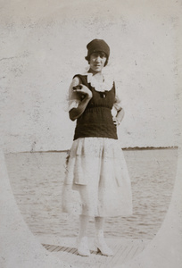 Edie Gundry holding a camera, Wusong, near Shanghai