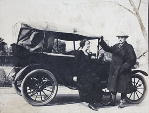 Tongshan Road neighbours, Mrs and Mr W. J. Terrill, with their motorcar, Hongkou, Shanghai