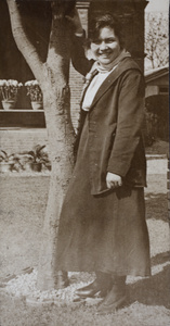 Hannah standing beside a garden tree, 35 Tongshan Road, Hongkou, Shanghai