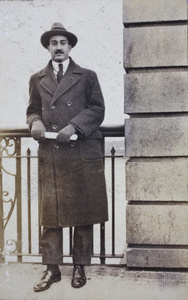 Mr E. Castrillo standing on the Garden Bridge, Shanghai