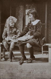 Maggie Hutchinson and Nora sharing a box of chocolates, 35 Tongshan Road, Hongkou, Shanghai