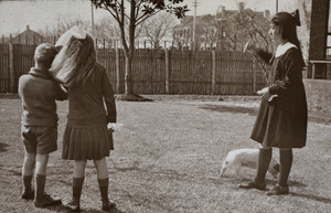 Maggie Hutchinson with two neighbouring children in the garden of 35 Tongshan Road, Hongkou, Shanghai