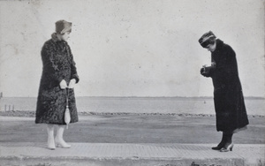 Two young women, one with a camera, Wusong, February 1920