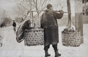 Pedlar on snow covered Tongshan Road, Hongkou, Shanghai, February 1919