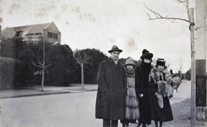 Charles Hutchinson with three young women, Hongkou district, Shanghai