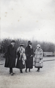Charles Hutchinson with three young women in Hongkou Park, Shanghai