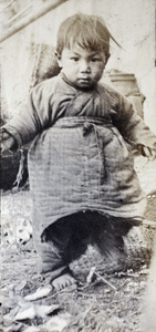 Boat-dwelling child on river bank, Shanghai