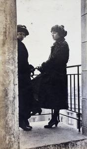 Two young women on a Sincere Department Store roof garden viewing platform, Shanghai