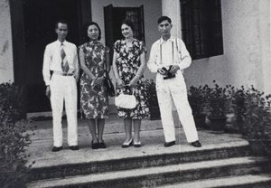 Unidentified man and woman with Sarah and Tom Hutchinson, Kowloon, Hong Kong