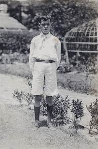Unidentified boy in the garden of 35 Tongshan Road, Hongkou, Shanghai