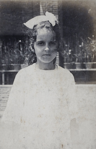 Unidentified girl in the garden of 35 Tongshan Road, Hongkou, Shanghai