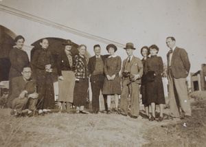 Gladys, Tom and Bea Hutchinson with a group of unidentified people, Kowloon, Hong Kong