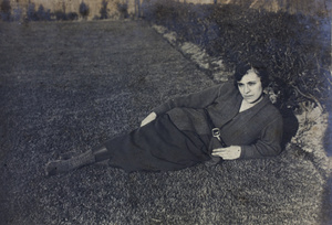 Margie Hutchinson reclining on the garden lawn, 35 Tongshan Road, Hongkou, Shangha