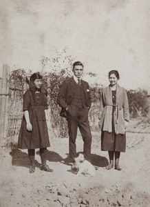Maggie, Bill and Sarah Hutchinson with one of their dogs, 35 Tongshan Road, Hongkou, Shanghai