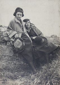 Maggie Hutchinson and an unidentified woman leaning on the old city wall, Kunshan
