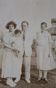 The Koskey family and Sarah Hutchinson in the garden, 35 Tongshan Road, Hongkou, Shanghai