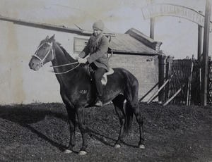 Mr W. G. Crokam mounted on a horse, Kalgan Dairy Farm, Shanghai 