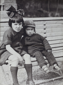 Miss Oliveira sitting with Bea Hutchinson on a garden bench, 35 Tongshan Road, Hongkou, Shanghai 