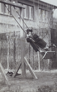 Two Oliveira sisters on the garden swing, 35 Tongshan Road, Hongkou, Shanghai