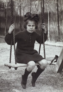 Miss Oliveira on the garden swing, 35 Tongshan Road, Hongkou, Shanghai