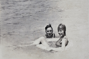 Mabel Parker sitting afloat in a lifebuoy in the Open Air Pool, Hongkou, Shanghai, 1924 