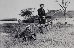 British Royal Navy men with a machine gun near a wooden bridge, Shanghai