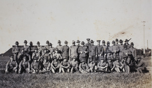 Tom Hutchinson in a large group of American Company volunteers and officers, Shanghai