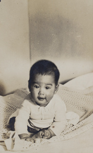 Bea Hutchinson sitting on a baby blanket, Shanghai