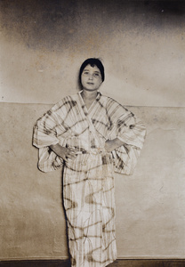 Sarah Hutchinson wearing a kimono made from fabric patterned with a 'rice plant in water' decorative motif, Shanghai