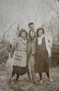 Unidentified man with two unidentified women on a day trip in Quinsan
