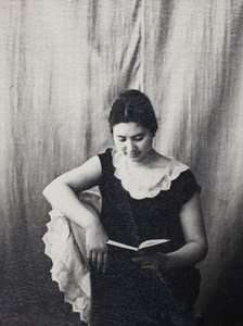 Sarah Hutchinson reading a book, Shanghai