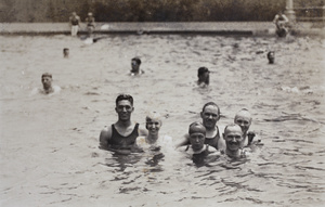 Bill Hutchinson standing in the Open Air Pool with other bathers, Hongkou, Shanghai, 1925