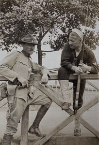 An American (Shanghai Volunteer Corps) and an American marine, Kiangsi Road Bridge, Shanghai, 1925