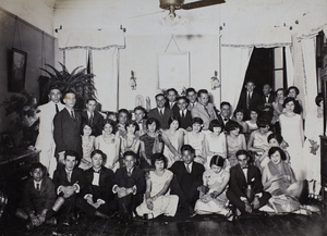 Hutchinson family members and friends at a party, 35 Tongshan Road, Hongkou, Shanghai, October 1925