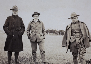 Two uniformed American Shanghai Volunteer Corps members with a third man, Shanghai