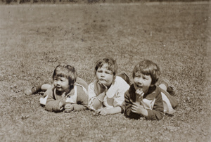 Gladys Hutchinson, Thelma Thiis, and Bea Hutchinson, posing on the garden lawn, 35 Tongshan Road, Hongkou, Shanghai