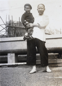 Amah and Roy Hutchinson on the roof terrace, Apartment 63, 6 Route Voyron, Shanghai