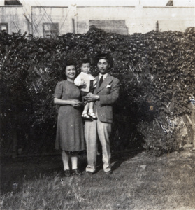 Lucy, Roy and Fred Hutchinson in a garden, Shanghai