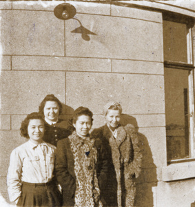 Lucy Hutchinson, with an unidentified woman, Mary Ahmed, and Katusha, on the roof terrace outside Apartment 63, 6 Route Voyron, Shanghai