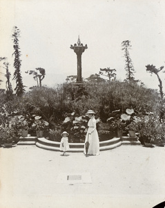 Beside a fountain, Hong Kong public gardens