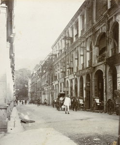 Businesses and rickshaws on Queen's Road, Hong Kong