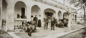 Group outside a house in Fort-Bayard (Zhanjiang) - The "Pink ‘Un"