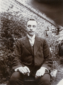 Portrait of William Hoy in a garden