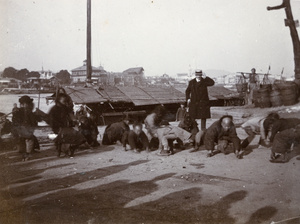 Children gathering thrown coins