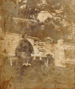 Gladys and Eileen Hughes, with Chinese nursemaids, Amoy, 1891
