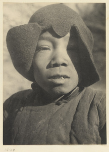 Boy wearing felt hat