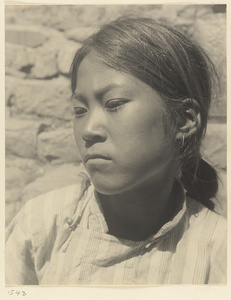 Woman from the 'Lost Tribe' country wearring earrings