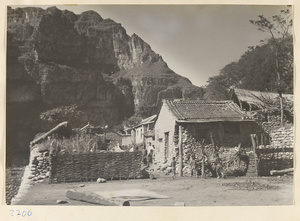 Houses and villagers in Lo-pu-ch'iao Village [sic] in the Jumahe Valley