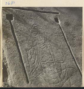 Figure of Buddha carved in rock wall along river in the Lost Tribe country